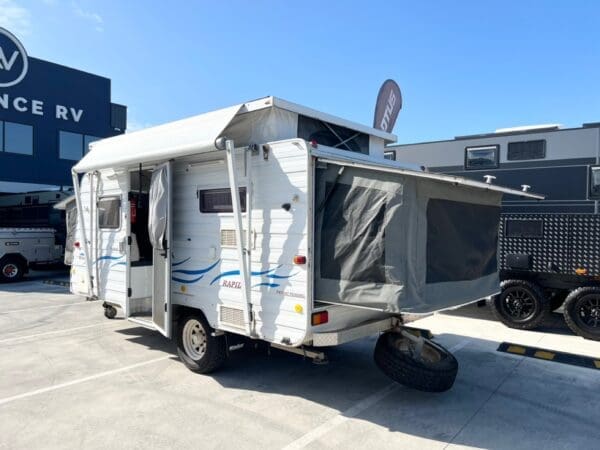  ensuring a snug and safe shelter.<br>• Dometic 90L Fridge: Keep your food fresh and your drinks cold.<br>• TV on a Swinging Arm: Enjoy your favourite shows with adjustable viewing angles.<br>• Annex: Extra living space to relax or entertain.<br>• Air Conditioner: Stay cool on even the hottest days.<br>• Gas 4x Burner Stove Top & Grill: Cook up delicious meals wherever you go.<br>• Telescopic Table Top Leg: Adjustable table height for convenience.<br>• Gas Bayonet: Connect additional gas appliances with ease.<br>• 4kg Gas Bottles x 2: Plenty of gas for cooking and heating.<br>• Tool Box: Store all your essential tools and spare parts.<br>• External Co-Axle Point: Connect external accessories effortlessly.<br>• Tunnel Boot: Extra storage space for your gear.<br>• Solar Panel on Roof: Harness the sun’s power for off-grid adventures.<br>• Dual Battery System: Ample power supply for all your needs.<br>• Inverter: Convert DC to AC power for standard devices.<br>• 12v Pump: Reliable water pressure for sinks and showers.<br>• 12v Sockets: Power your electronics with ease.<br>• Pressure Hatch: Easy access and ventilation for internal components.<br>• Shock Absorbers on Each Tyre: Smooth ride and improved stability.<br>• Water Tank: Essential for your water supply.<br>• 235/75R15 Tyres: Off-road size for superior traction.<br>• Off Road Coupling: Perfect for off-road towing adventures.<br>• Separate Flyscreen Entry Door: Keep bugs out while allowing fresh air in.<br>Whether you’re planning a weekend getaway or a cross-country journey