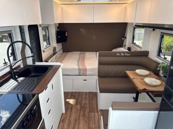  timberless caravan is built to conquer the toughest terrains while providing a cozy haven for your family.<br /><br />Key Specifications:<br />Length: 18.7 ft / 5.7 m<br />Sleeps: Up to 5 people<br />Chassis: Automotive High Tensile Steel<br />Suspension: Independent Wishbone with Air Bags<br />Brakes: 12” Electric Drum Brakes<br />Wheels: 16-inch Off-Road Tyres with Alloy Rims<br />Water Tanks: 360L Fresh Water
