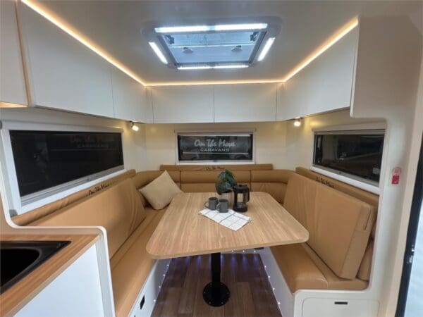  plus an in-built air compressor for smooth rides.<br />Spacious Interior: Separate bedroom with a queen memory foam mattress and rear club lounge/dining area. Includes lightweight plywood furniture